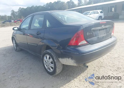 2004 Ford Focus Se z USA, uszkodzony, nr VIN 1FAFP34354W113883